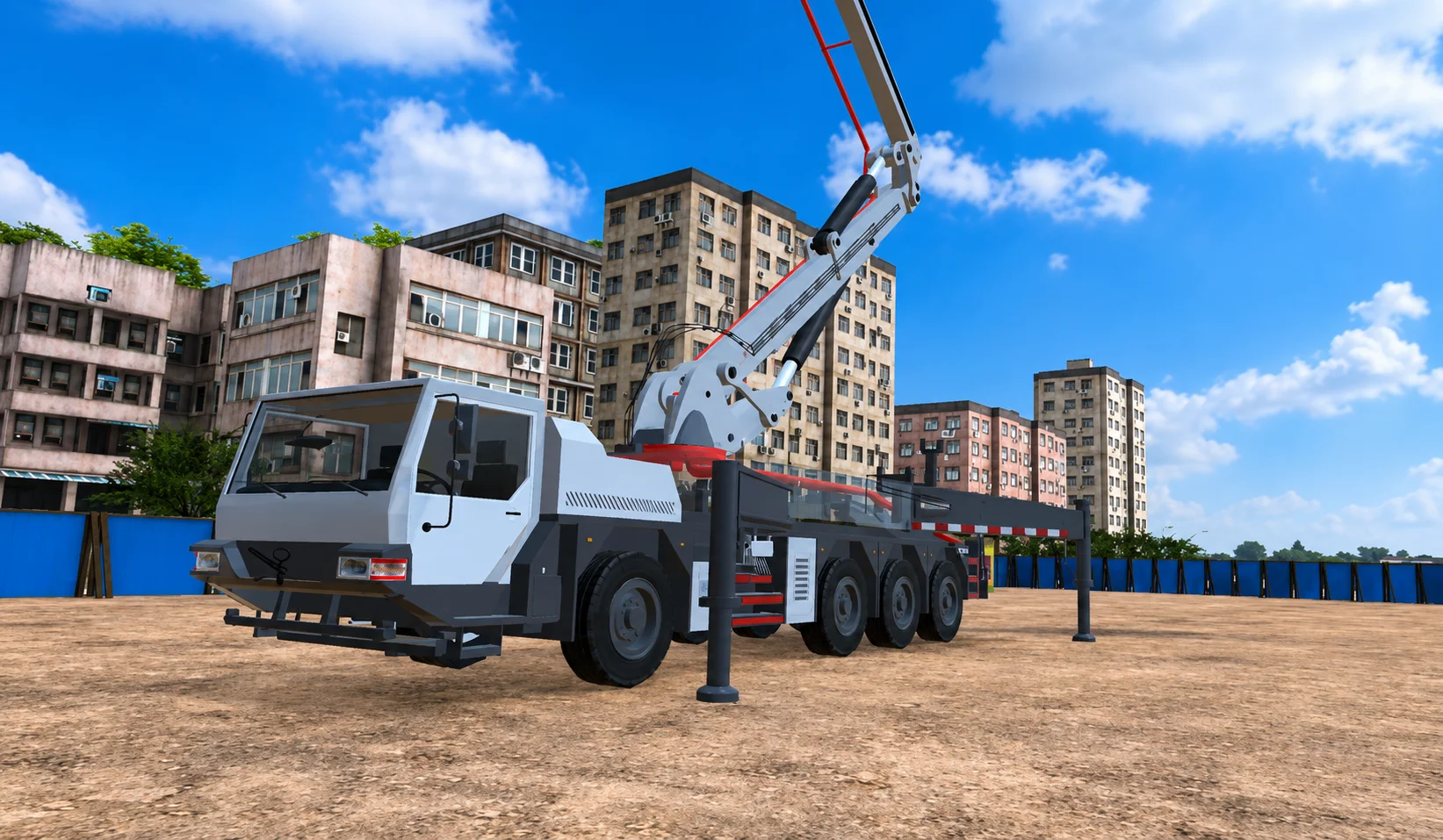 Concrete placer boom truck parked on outriggers with the boom folded for transport